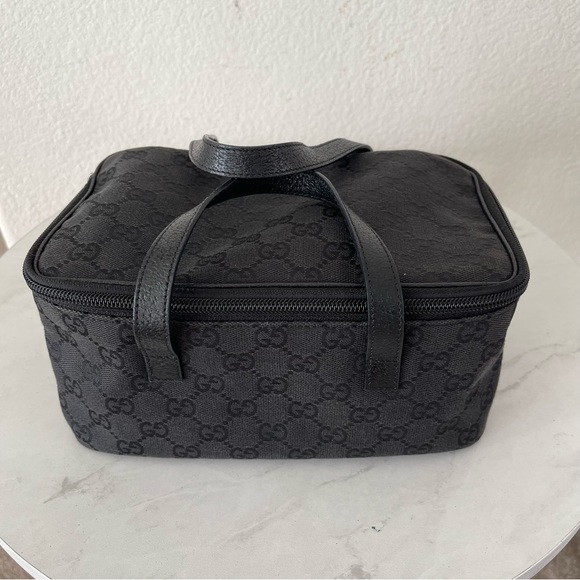 Gucci Handbags - Gucci Black GG Canvas Vanity Bag